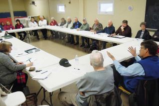 South Frontenac councilor Allan McPhail addresses the concerns of the Pleasant Valley group regarding a proposed subdivision in Hartington.